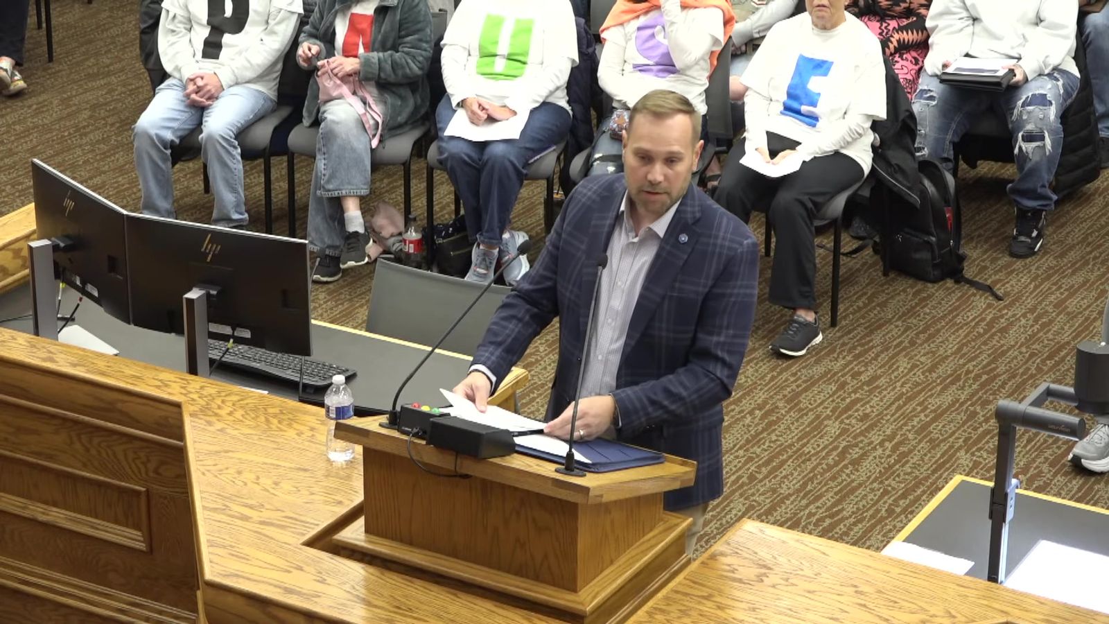 Dr. Brent Van Aartsen of Dakota State University speaks at the podium