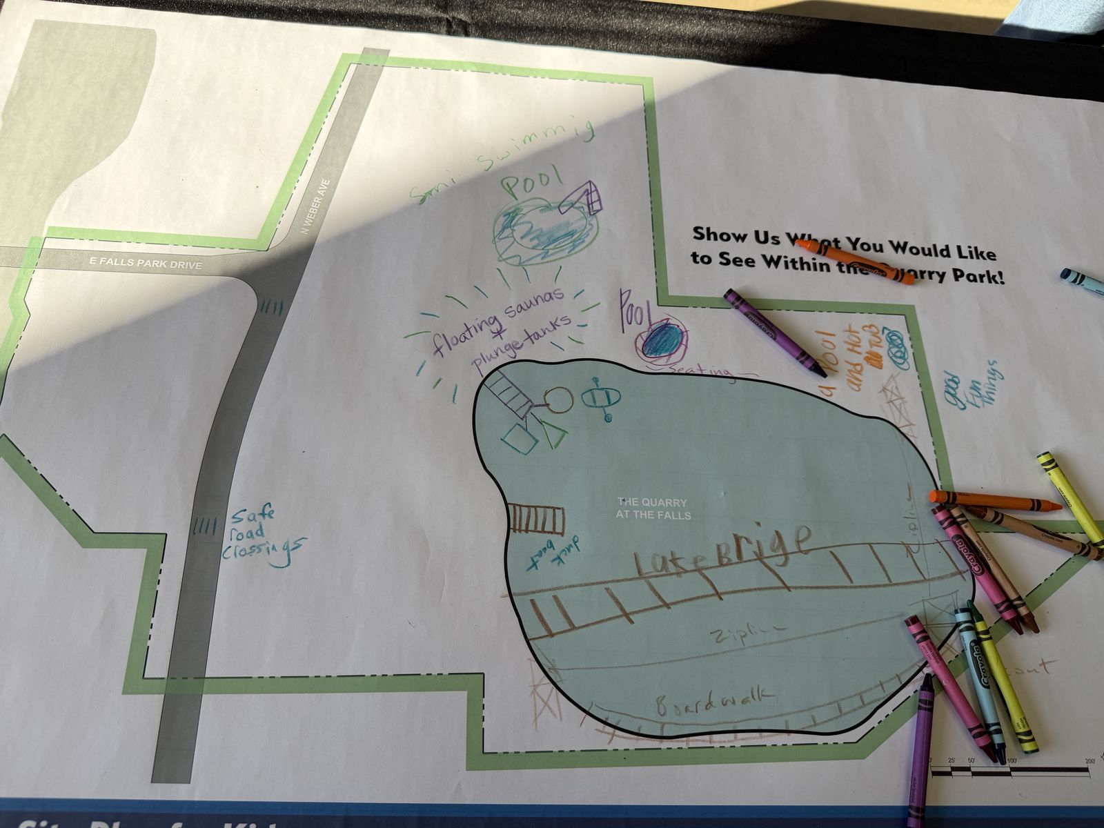 A kids' map of the quarry covered in crayon drawings